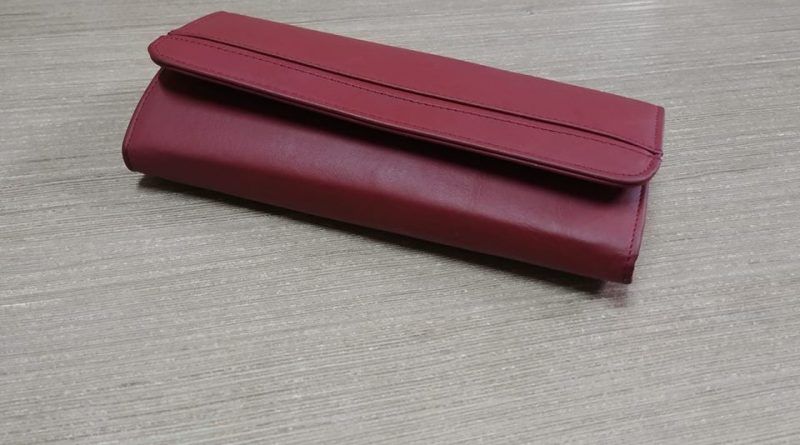 Portofel cu bani, returnat de polițiști